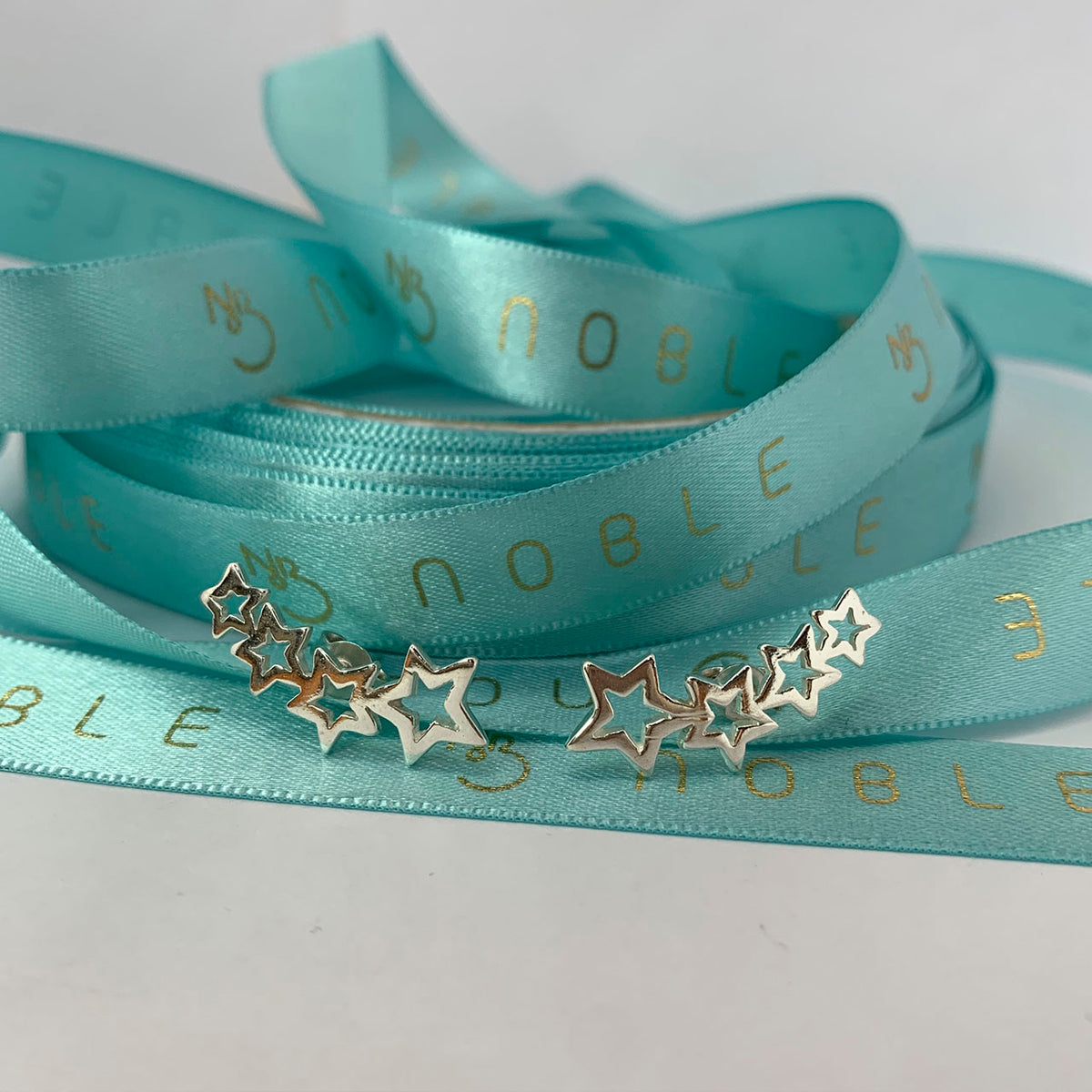 BRINCO DE PRATA EARCUFF ESTRELA