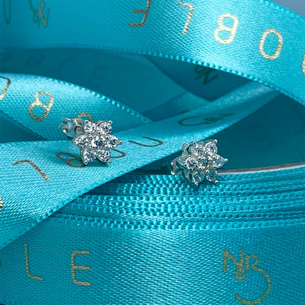 SILVER ZIRCONIA FLOWER EARRING