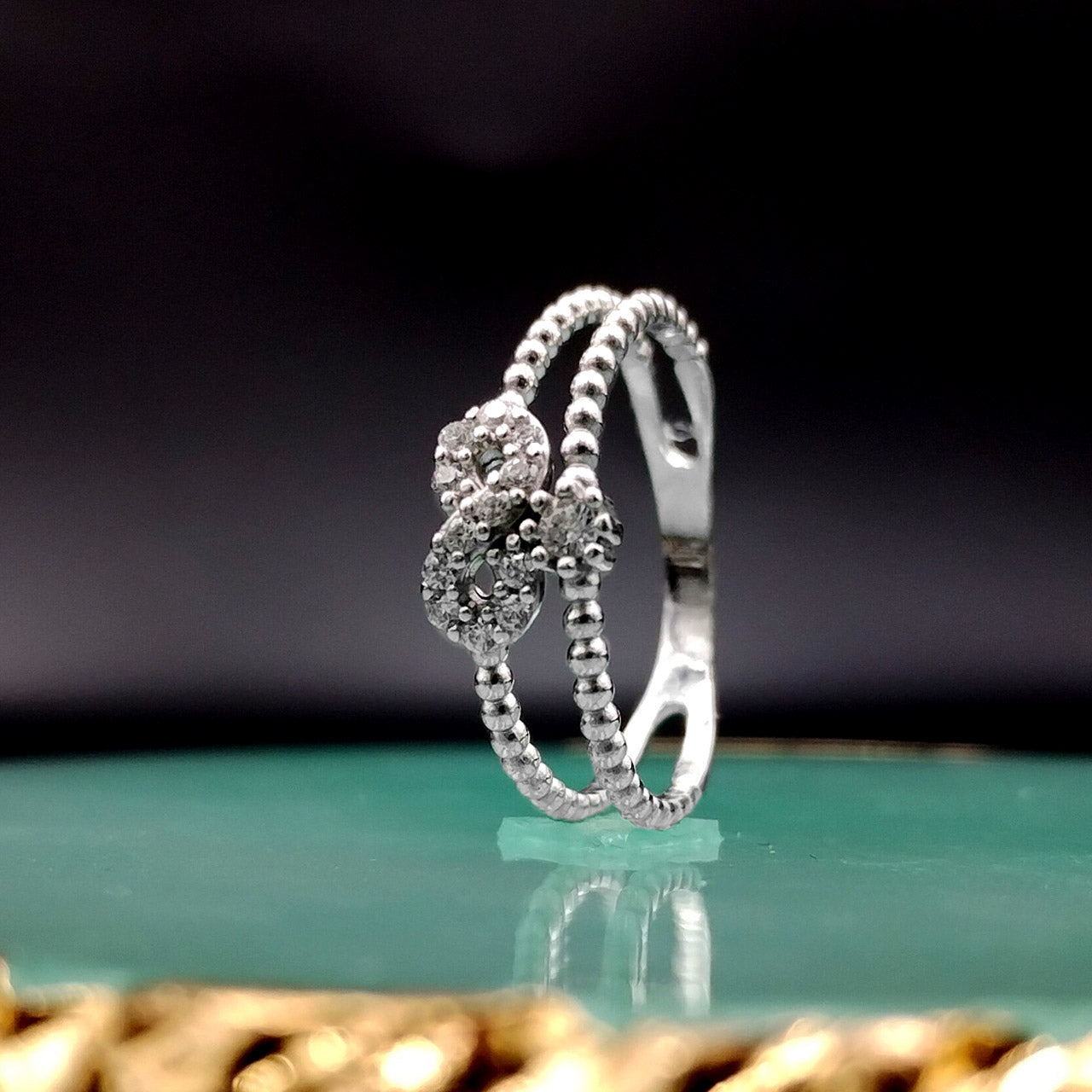 ANEL INFINITO CRAVEJADO ARO DUPLO