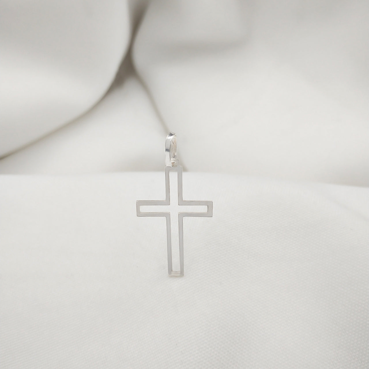 LEAKED CROSS SILVER PENDANT