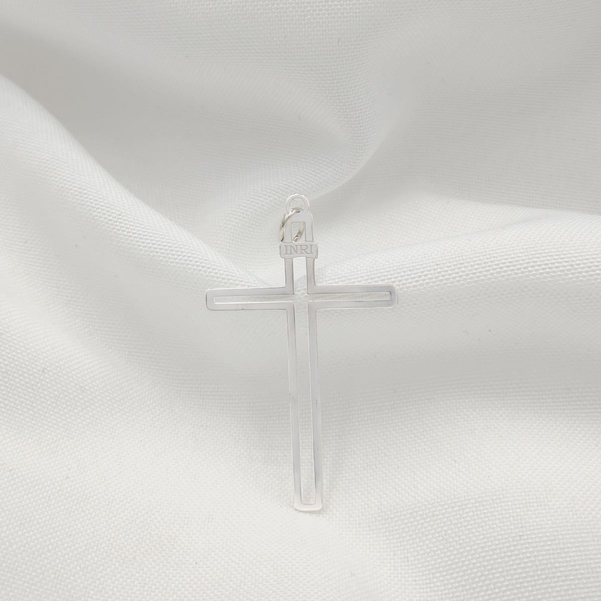 LEAKED CROSS SILVER PENDANT